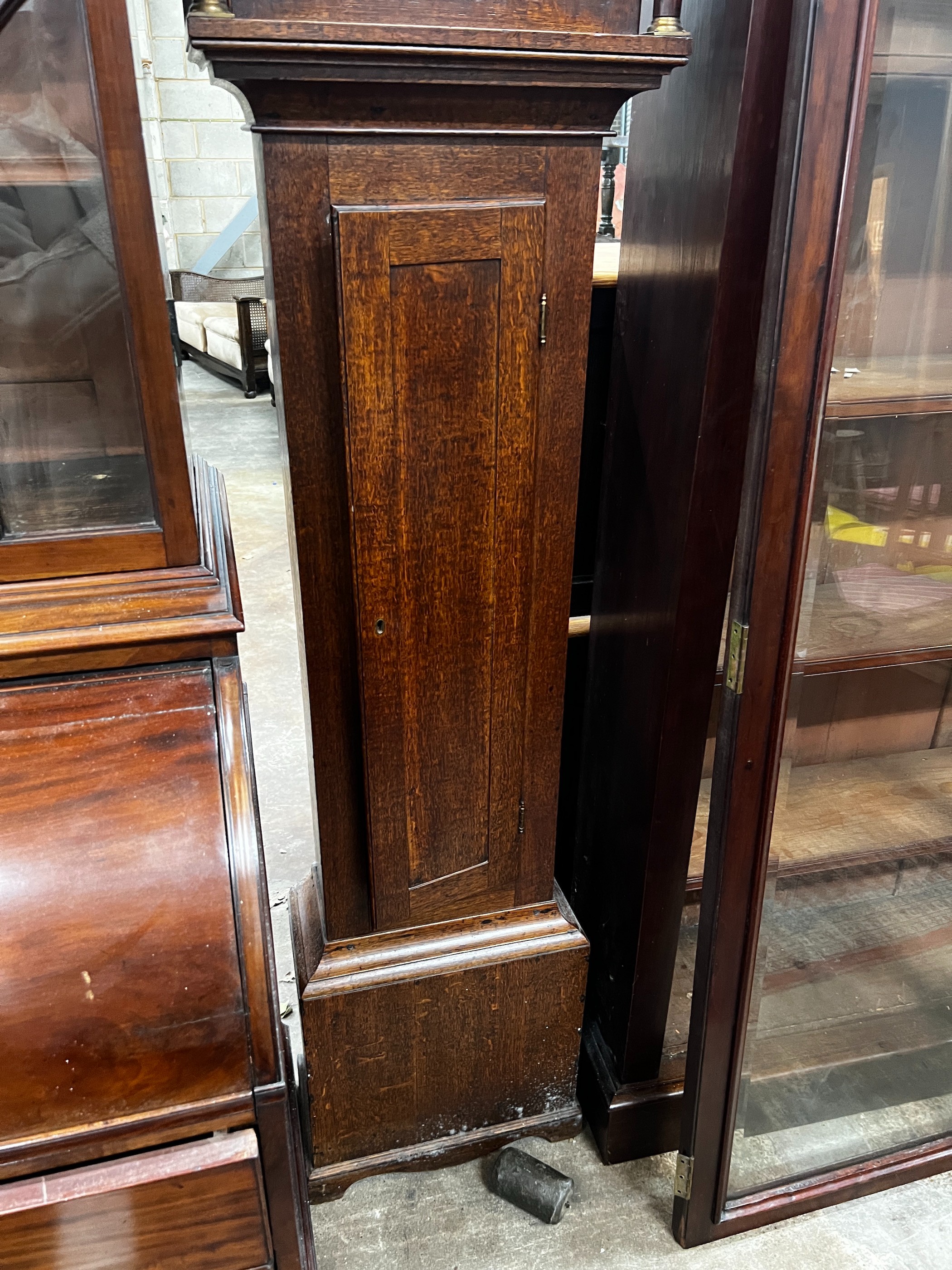 An 18th century oak 30 hour longcase clock, the engraved brass dial signed Thomas Millett 'Ware', height 195cm